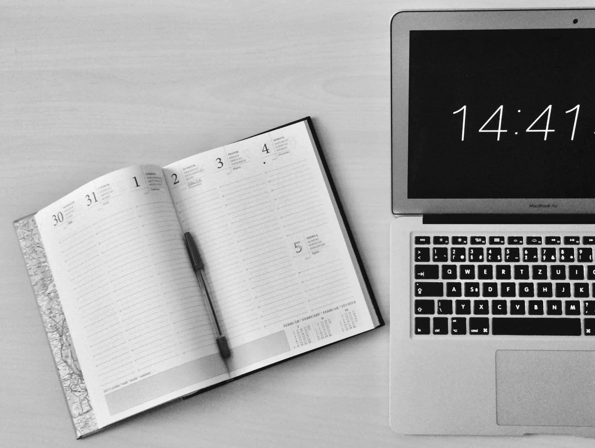 how to follow up on a job application - a planner with a laptop on the right side with time 14:41