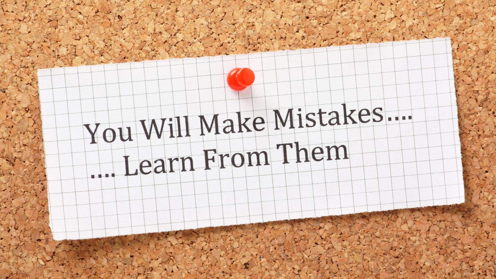 a piece of paper that says you will make mistakes...learn from them pinned to a corkboard