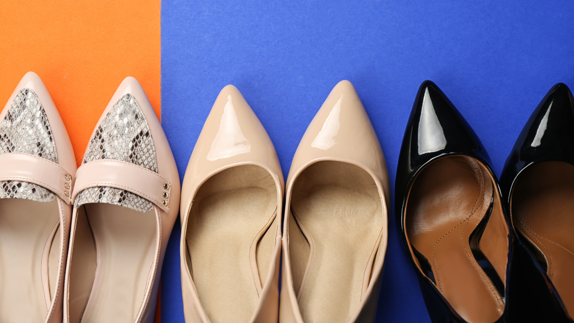 three different pairs of female shoes on a orange-blue backround